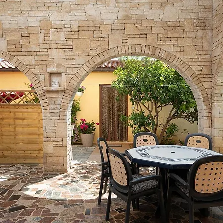 Modern Stone House With Flowers & Playground