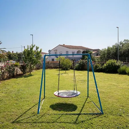 Modern Stone House With Garden And Playground