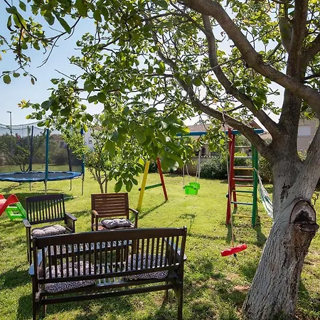 Modern Stone House With Garden And Playground