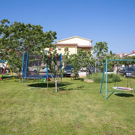 Modern Stone House With Flowers & Playground Medulin