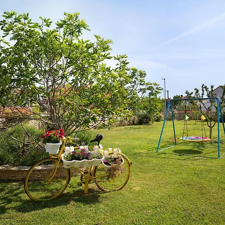 Modern Stone House With Flowers & Playground Medulin